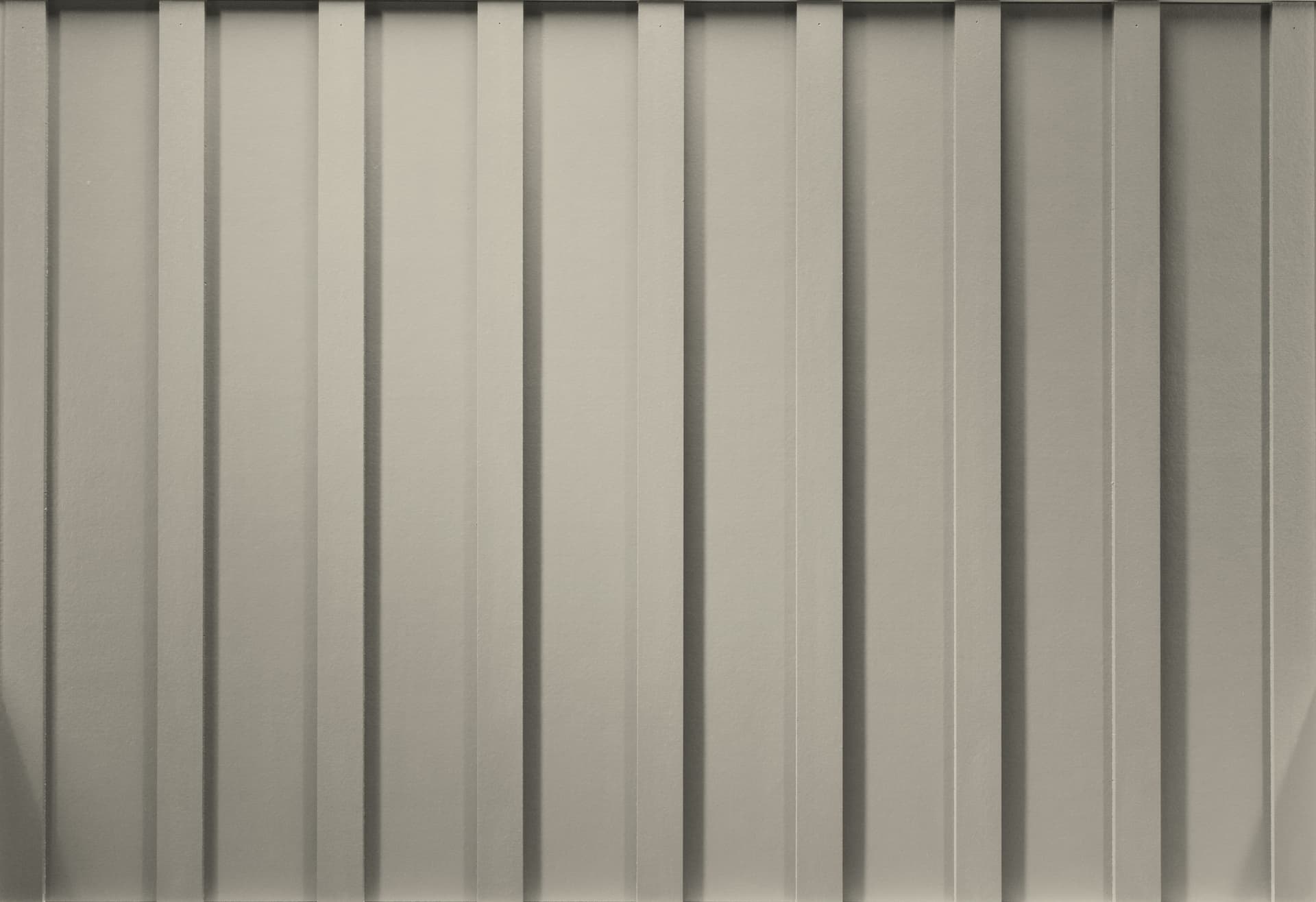 Manufacturer-supplied Hardie Panel and batten siding in Cobble Stone