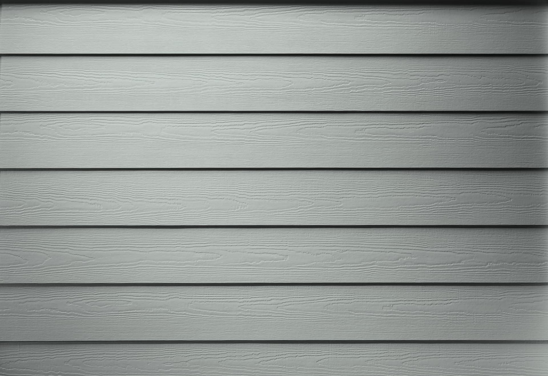 Manufacturer-supplied Hardie Plank Select Cedarmill siding in Light Mist