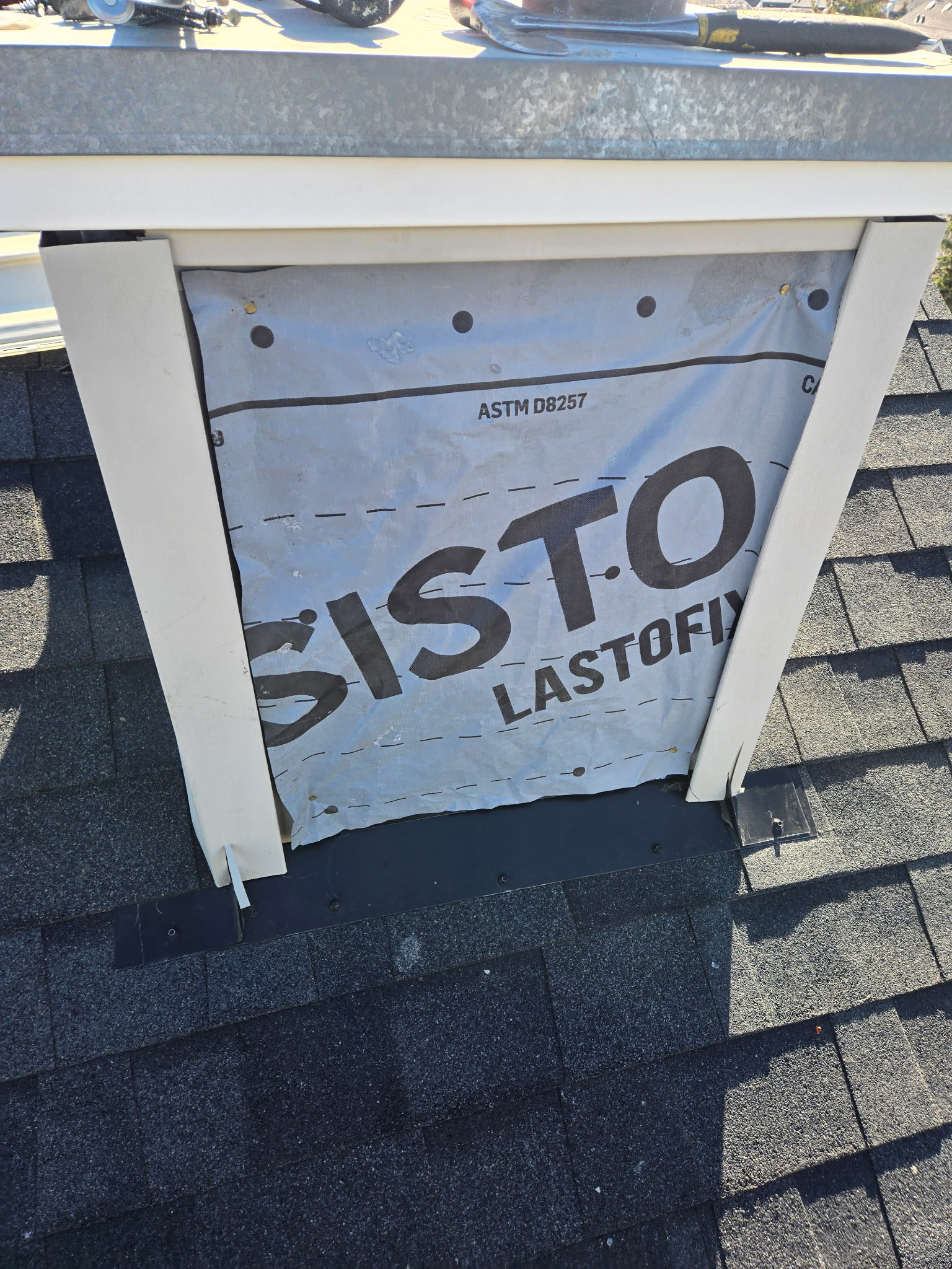 Wind-damaged siding and soffit area on a Calgary home